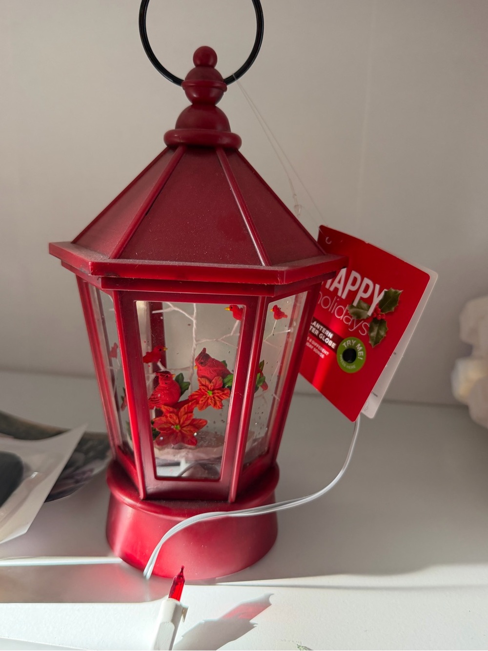 Festive Red Holiday Lantern with Floral Globe